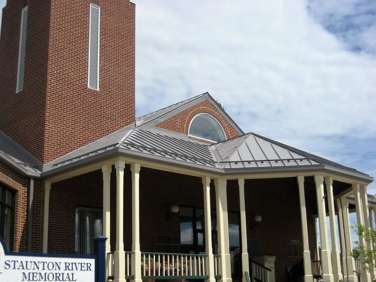 Skilled roofing craftsmen working on a residential roof in James City